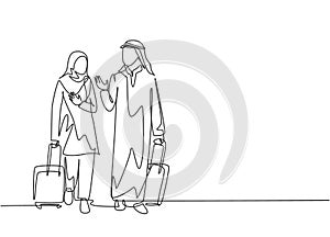 Single continuous line drawing of young male and female muslim managers talking after do business trip abroad. Arab middle east