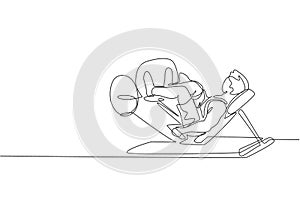 Single continuous line drawing of young sportive man training with leg press in sport gymnasium club center. Fitness stretching