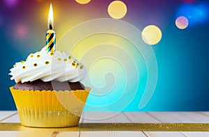 single cupcake adorned with white frosting, golden sprinkles, and lit birthday candle, soft bokeh background, banner