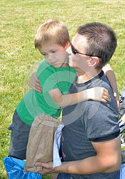 Father and son at school picnic