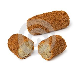 Single deep fried Dutch kroket and a sliced one