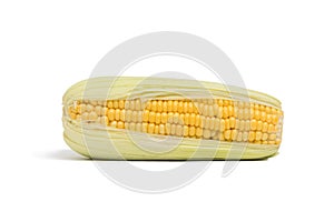 Single ear of sweet corn isolated on white background