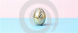 Elegant Golden Easter Egg on Pastel Pink and Blue Background