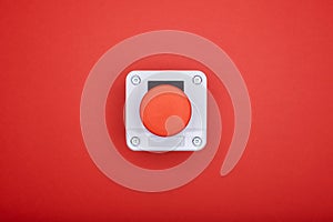 Single emergency button at the red background