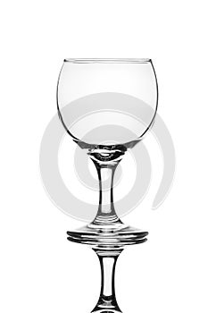 Single empty wine glass isolated on a white background.