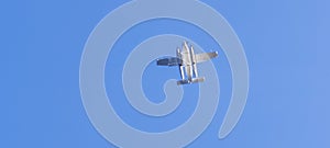 A single-engine floatplane in the sky