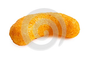Single extruded cheese puff isolated on white