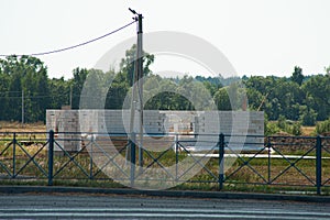 Single-family home made of hollow blocks or bricks. New unfinished stand-alone house building under construction.