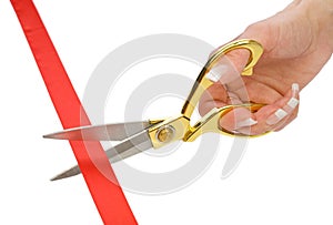 Single female hand with Scissors and red tape