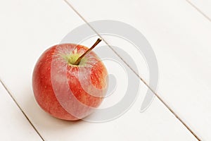 Single fresh apple on the table