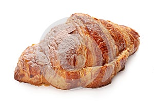 Single fresh baked croissant isolated