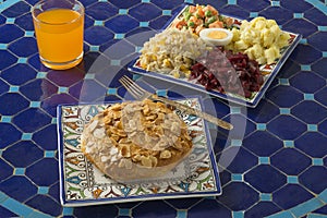 Single fresh baked traditional Moroccan small bastella and salade