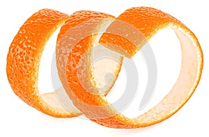 Single fresh orange peel isolated on white background, spiral form. Orange zest