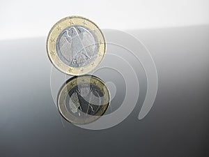 Single German Euro coins on grey background