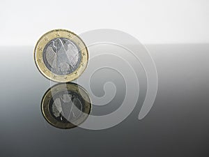 Single German Euro coins on grey background