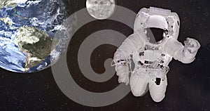 Single giant astronaut in outer space near Earth and moon. Elements of this image were furnished by NASA.