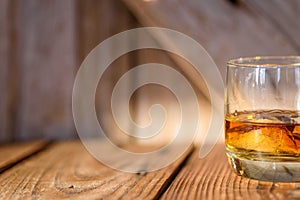 Single glass of bourbon on the rocks