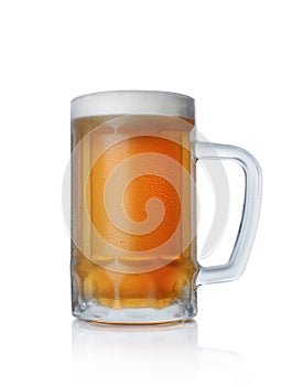 Single glass mug of cold light beer with foam