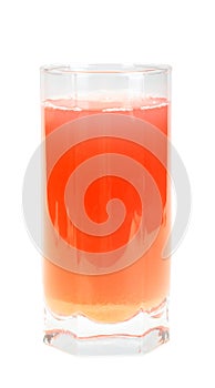 Single glass with orange fruit-juice