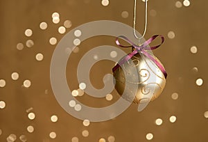 Single Gold Christmas ball with lights