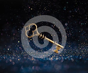 Single golden skeleton key surrounded by sparkling lights. Business concepts of unlocking potential, key to success, or financial