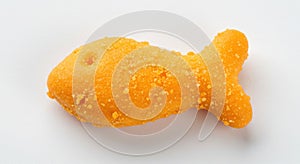 A single goldfish cracker on a plain white background shot