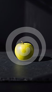 Single Green Apple on Slate photo