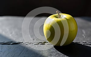 Single Green Apple on Slate photo