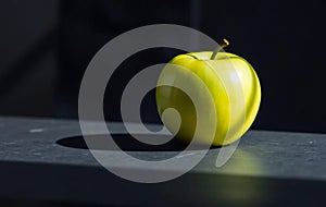 Single Green Apple on Slate photo