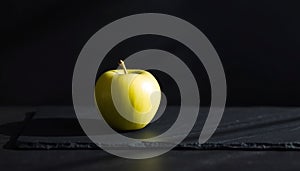 Single Green Apple on Slate photo