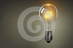 A single illuminated light bulb, casting a warm glow that symbolizes ideas, and inspiration