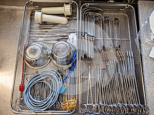 single instrument tray contains various surgical instruments