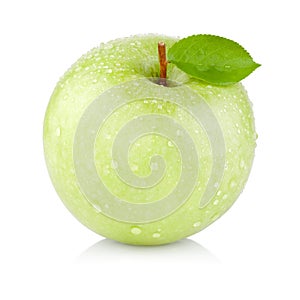 Single juicy green apple with leaves