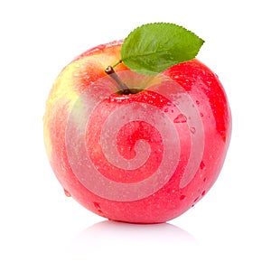 Single juicy Red apple with leaves