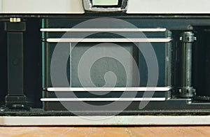 Single lens reflect camera open film pressure plate and showing shutter curtain