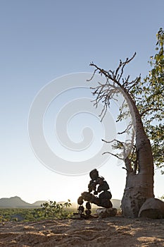 A single Lone Stone man of the Kaokoland. Contemplating existence. Marble. Kaokoland. Kunene Region, Namibia.