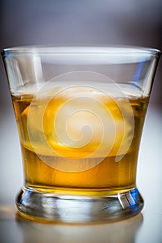 Single Malt Whisky Shot With Ice Cube