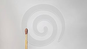 Single Matchstick placed on the rule of thirds grid, matchstick stock photos.