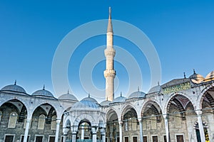 Single minaret against blue sky at the corner of  blue Mosque also called the Sultan Ahmed Mosque or Sultan Ahmet Mosque in