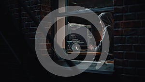 Single-Minded Professional Programmer Obsessively Writing a Code on His Desktop Computer, Late at