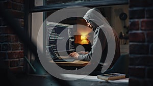 Single-Minded Professional Programmer Obsessively Writing a Code on His Desktop Computer, Late at