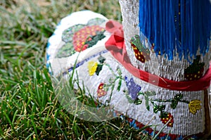 A single moccasin with beautiful handcrafted colorful bead work