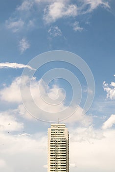 Single modern building against blue sky