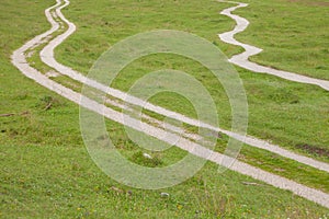 A single mountain path splits in two different directions