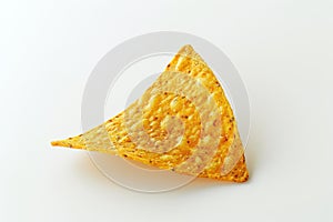 Single nacho chip placed on a flat white background.