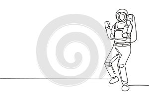 Single one line drawing female astronaut stands with celebrate gesture wearing space suit exploring earth, moon, other planets in