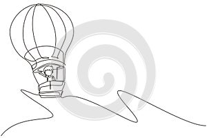 Single one line drawing little boy aeronaut in hot-air balloon at sky. Happy kids riding hot air balloon. Children on hot air