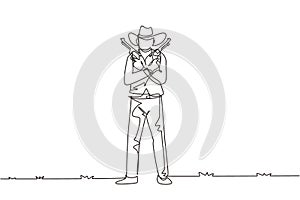 Single one line drawing wild west gunslinger holding two guns. American cowboys holding his two weapons above his chest. Weapons