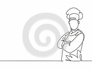 Single one line drawing of young attractive man chef posing stand elegantly with arm crossed on chest. Excellent hotel restaurant