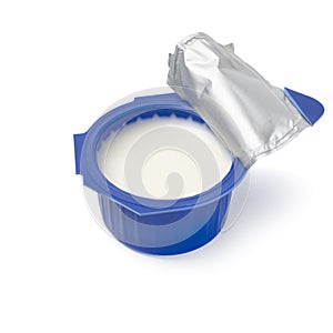 Single open blue plastic cup of coffee creamer